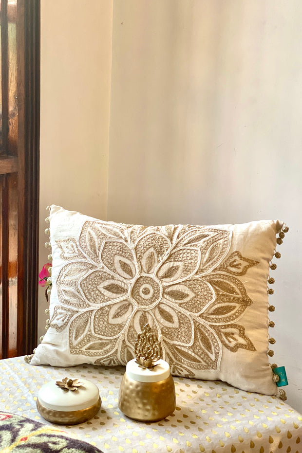 Gold and white embroidered cushion cover