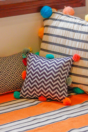 Ikkat Chevron Cushion with Colorful Pompoms